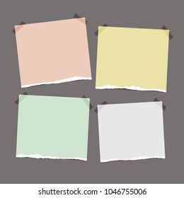 Set of torn paper sheets in pastel colors stuck with sticky tape on grey background. Ripped notepaper with space for your text.