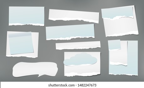 Set of torn white and blue note, notebook strips, speech bubble, paper pieces stuck on dark grey background. Vector illustration