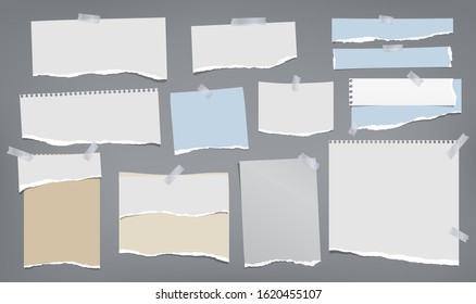 Set of torn white and blue note, notebook paper strips and pieces stuck with sticky tape on dark grey background. Vector illustration