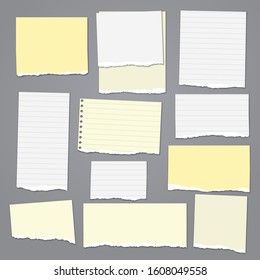 Set of torn white, and yellow lined note, notebook paper strips and pieces with soft shadow stuck on dark grey background. Vector illustration