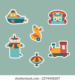 Set of toys of children. Ship, phone, duck, clown, spinning top, train.