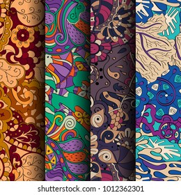 Set of tracery colorful seamless patterns. Vertical stripes. Curved doodling backgrounds for textile or printing with mehndi and ethnic motives. Vector