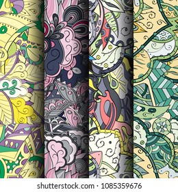 Set of tracery colorful seamless patterns. Vertical stripes. Curved doodling backgrounds for textile or printing with mehndi and ethnic motives. Vector