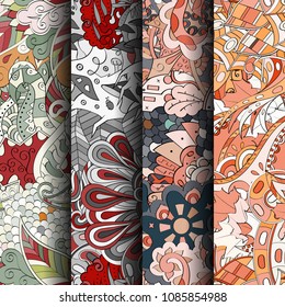 Set of tracery colorful seamless patterns. Vertical stripes. Curved doodling backgrounds for textile or printing with mehndi and ethnic motives. Vector