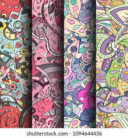 Set of tracery colorful seamless patterns. Vertical stripes. Curved doodling backgrounds for textile or printing with mehndi and ethnic motives. Vector