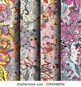 Set of tracery colorful seamless patterns. Vertical stripes. Curved doodling backgrounds for textile or printing with mehndi and ethnic motives. Vector