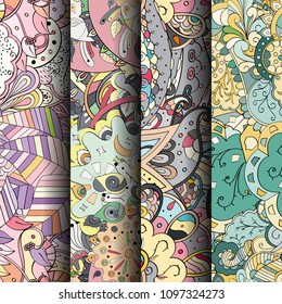 Set of tracery colorful seamless patterns. Vertical stripes. Curved doodling backgrounds for textile or printing with mehndi and ethnic motives. Vector