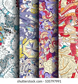Set of tracery colorful seamless patterns. Curved doodling backgrounds for textile of printing with mehndi and ethnic motives. Vector.
