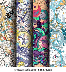 Set of tracery colorful seamless patterns. Curved doodling backgrounds for textile of printing with mehndi and ethnic motives. Vector.