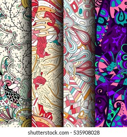 Set of tracery colorful seamless patterns. Curved doodling backgrounds for textile of printing with mehndi and ethnic motives. Vector.