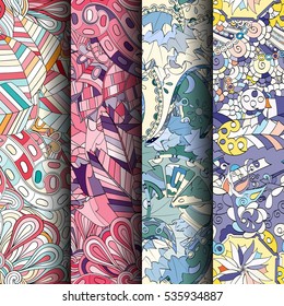 Set of tracery colorful seamless patterns. Curved doodling backgrounds for textile of printing with mehndi and ethnic motives. Vector.