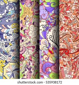 Set of tracery colorful seamless patterns. Curved doodling backgrounds for textile of printing with mehndi and ethnic motives. Vector.