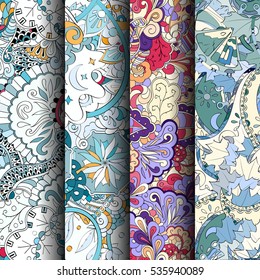 Set of tracery colorful seamless patterns. Curved doodling backgrounds for textile of printing with mehndi and ethnic motives. Vector.