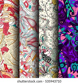 Set of tracery colorful seamless patterns. Curved doodling backgrounds for textile of printing with mehndi and ethnic motives. Vector.