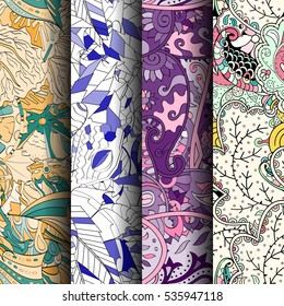 Set of tracery colorful seamless patterns. Curved doodling backgrounds for textile of printing with mehndi and ethnic motives. Vector.