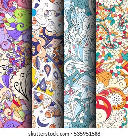 Set of tracery colorful seamless patterns. Curved doodling backgrounds for textile of printing with mehndi and ethnic motives. Vector.