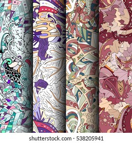Set of tracery colorful seamless patterns. Curved doodling backgrounds for textile of printing with mehndi and ethnic motives. Vector.