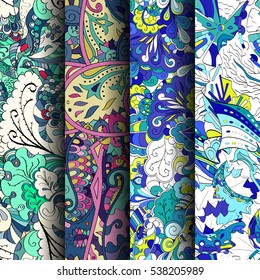 Set of tracery colorful seamless patterns. Curved doodling backgrounds for textile of printing with mehndi and ethnic motives. Vector.