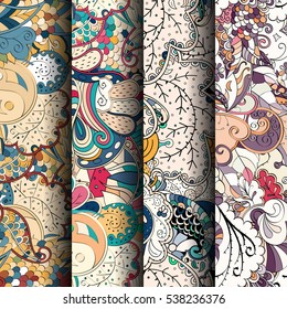 Set of tracery colorful seamless patterns. Curved doodling backgrounds for textile of printing with mehndi and ethnic motives. Vector.