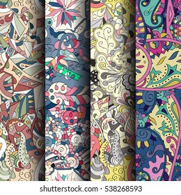 Set of tracery colorful seamless patterns. Curved doodling backgrounds for textile of printing with mehndi and ethnic motives. Vector.