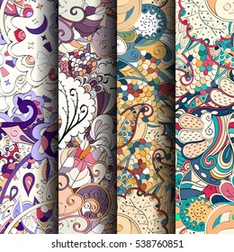 Set of tracery colorful seamless patterns. Curved doodling backgrounds for textile of printing with mehndi and ethnic motives. Vector.