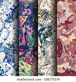 Set of tracery colorful seamless patterns. Curved doodling backgrounds for textile of printing with mehndi and ethnic motives. Vector.