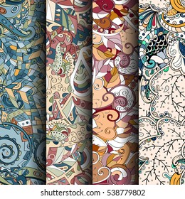 Set of tracery colorful seamless patterns. Curved doodling backgrounds for textile of printing with mehndi and ethnic motives. Vector.