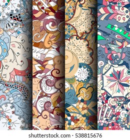 Set of tracery colorful seamless patterns. Curved doodling backgrounds for textile of printing with mehndi and ethnic motives. Vector.