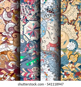 Set of tracery colorful seamless patterns. Curved doodling backgrounds for textile or printing with mehndi and ethnic motives. Vector.