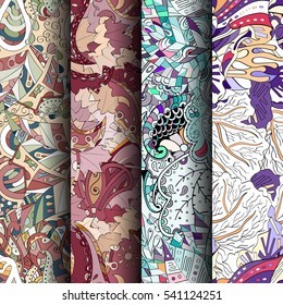 Set of tracery colorful seamless patterns. Curved doodling backgrounds for textile or printing with mehndi and ethnic motives. Vector.