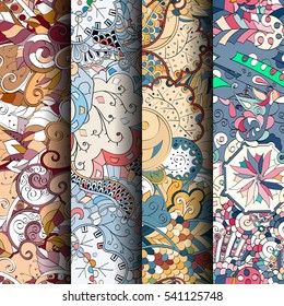 Set of tracery colorful seamless patterns. Curved doodling backgrounds for textile or printing with mehndi and ethnic motives. Vector.