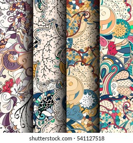 Set of tracery colorful seamless patterns. Curved doodling backgrounds for textile or printing with mehndi and ethnic motives. Vector.