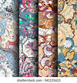 Set of tracery colorful seamless patterns. Curved doodling backgrounds for textile or printing with mehndi and ethnic motives. Vector.