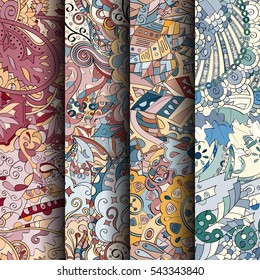 Set of tracery colorful seamless patterns. Curved doodling backgrounds for textile or printing with mehndi and ethnic motives. Vector.