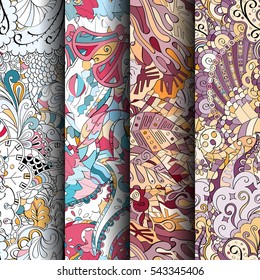 Set of tracery colorful seamless patterns. Curved doodling backgrounds for textile or printing with mehndi and ethnic motives. Vector.