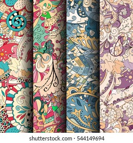 Set of tracery colorful seamless patterns. Curved doodling backgrounds for textile or printing with mehndi and ethnic motives. Vector.