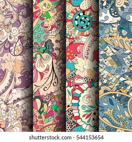 Set of tracery colorful seamless patterns. Curved doodling backgrounds for textile or printing with mehndi and ethnic motives. Vector.