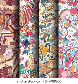 Set of tracery colorful seamless patterns. Curved doodling backgrounds for textile or printing with mehndi and ethnic motives. Vector.