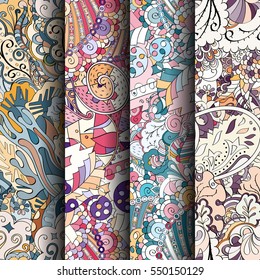 Set of tracery colorful seamless patterns. Curved doodling backgrounds for textile or printing with mehndi and ethnic motives. Vector.