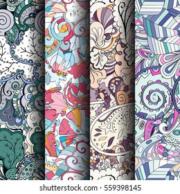 Set of tracery colorful seamless patterns. Curved doodling backgrounds for textile or printing with mehndi and ethnic motives. Vector.