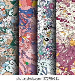 Set of tracery colorful seamless patterns. Curved doodling backgrounds for textile or printing with mehndi and ethnic motives. Vector.