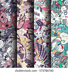 Set of tracery colorful seamless patterns. Curved doodling backgrounds for textile or printing with mehndi and ethnic motives. Vector.
