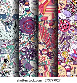 Set of tracery colorful seamless patterns. Curved doodling backgrounds for textile or printing with mehndi and ethnic motives. Vector.