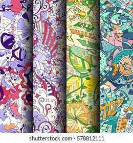 Set of tracery colorful seamless patterns. Curved doodling backgrounds for textile or printing with mehndi and ethnic motives. Vector.