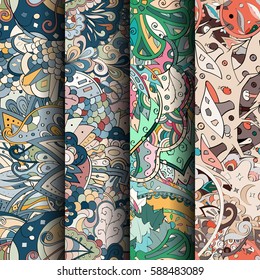 Set of tracery colorful seamless patterns. Curved doodling backgrounds for textile or printing with mehndi and ethnic motives. Vector.