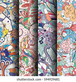 Set of tracery colorful seamless patterns. Curved doodling backgrounds for textile or printing with mehndi and ethnic motives. Vector.