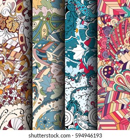 Set of tracery colorful seamless patterns. Curved doodling backgrounds for textile or printing with mehndi and ethnic motives. Vector.