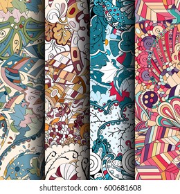 Set of tracery colorful seamless patterns. Curved doodling backgrounds for textile or printing with mehndi and ethnic motives. Vector.