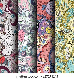 Set of tracery colorful seamless patterns. Curved doodling backgrounds for textile or printing with mehndi and ethnic motives. Vector