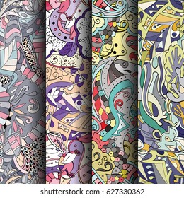 Set of tracery colorful seamless patterns. Curved doodling backgrounds for textile or printing with mehndi and ethnic motives. Vector